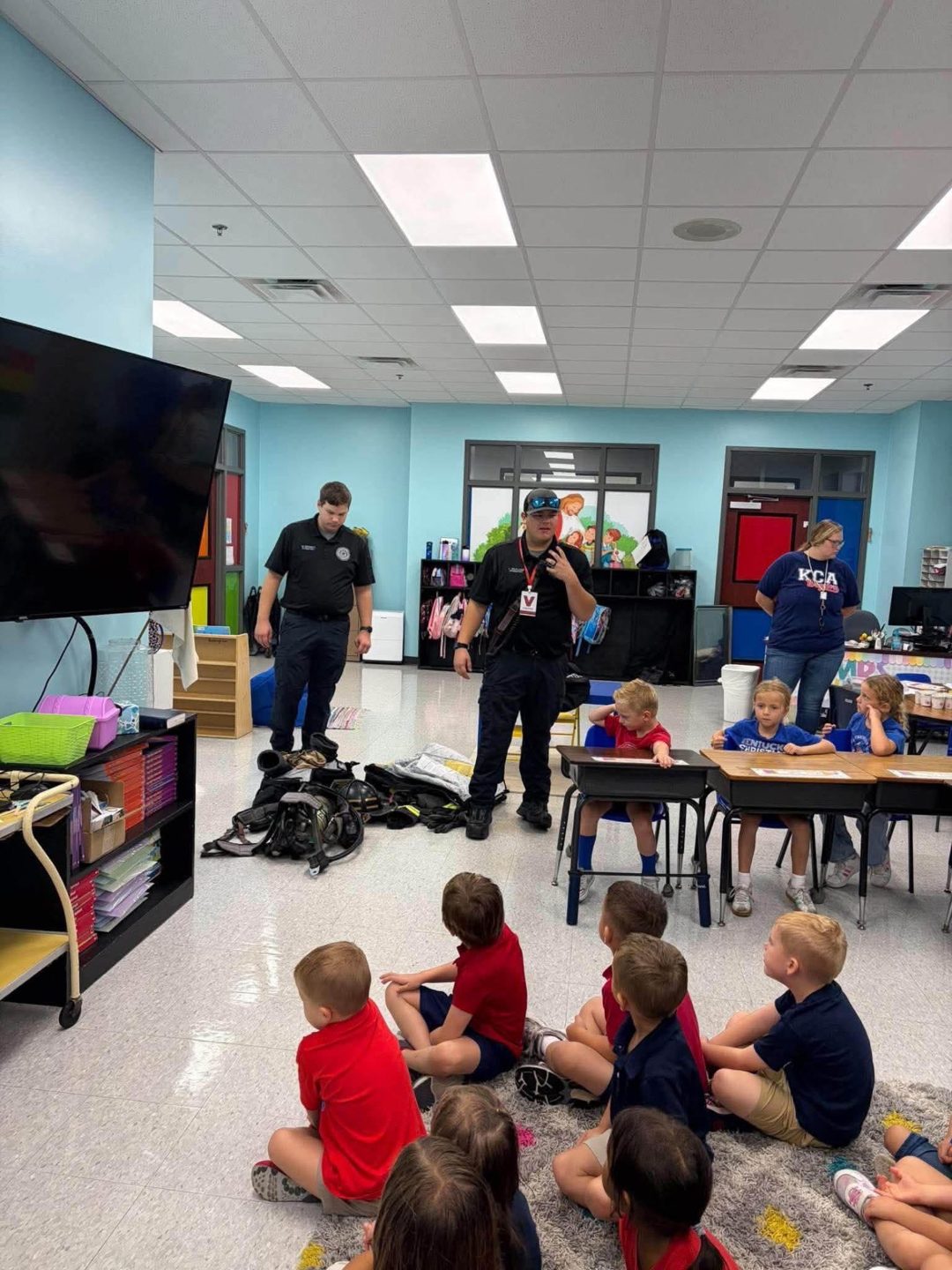 Firefighters visiting a KCA classroom