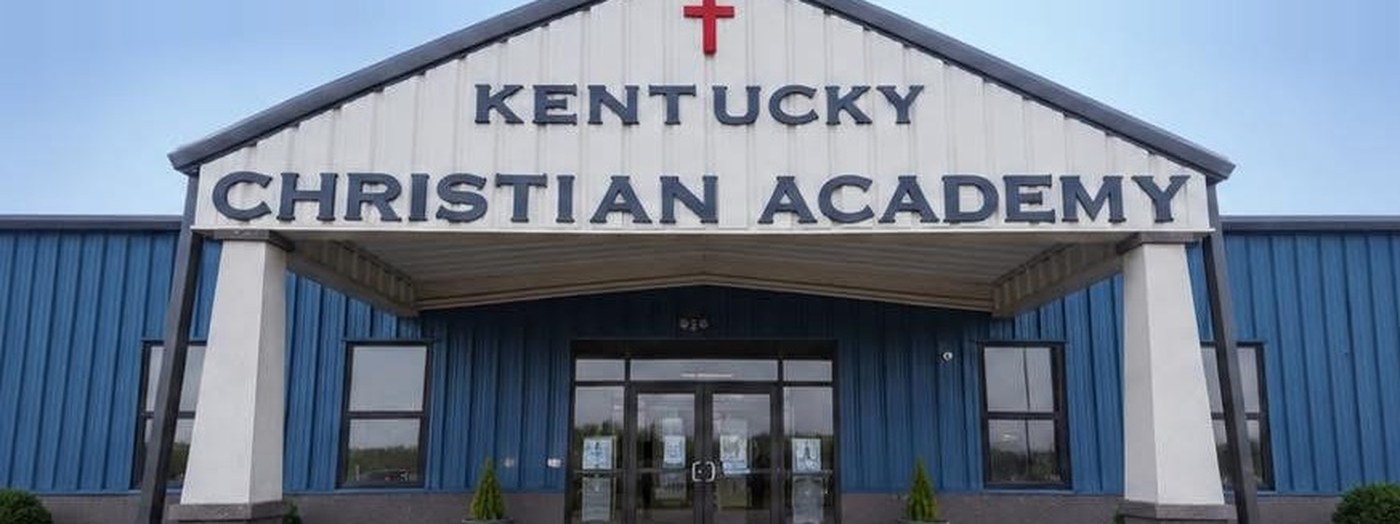 The Kentucky Christian Academy building in Campbellsville, Kentucky, with its name above the front entrance and a cross on the gable